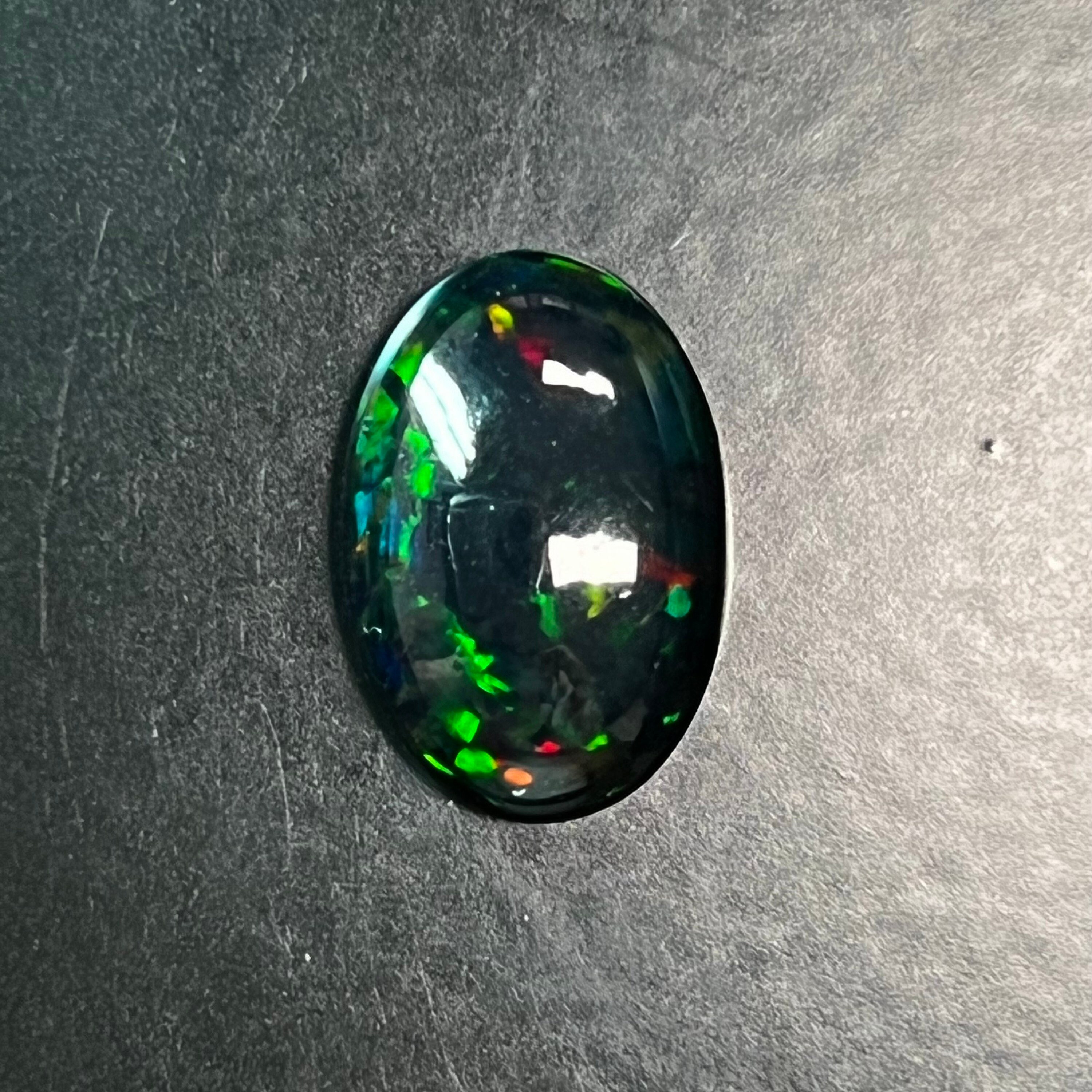 3.8ct,15.5x10.7x5.1mm, Oval Opal, Black Ethiopian Opal,black 3.8ct,15.5x10.7x5.1mm, Oval Opal, Black Ethiopian Opal,black