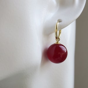 Wechselschmuck für Ohrhaken/Creolen/Ohrbügel, Bernstein Einhänger , leuchtend rote Kugeln 585/14K Gelbgold von Pebbles-Schmuckdesign Bild 1