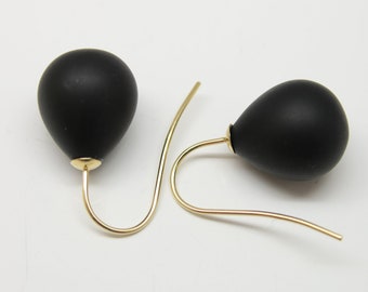 Noble 9k gold earring with large, matt black onyx, pebbles jewelry design