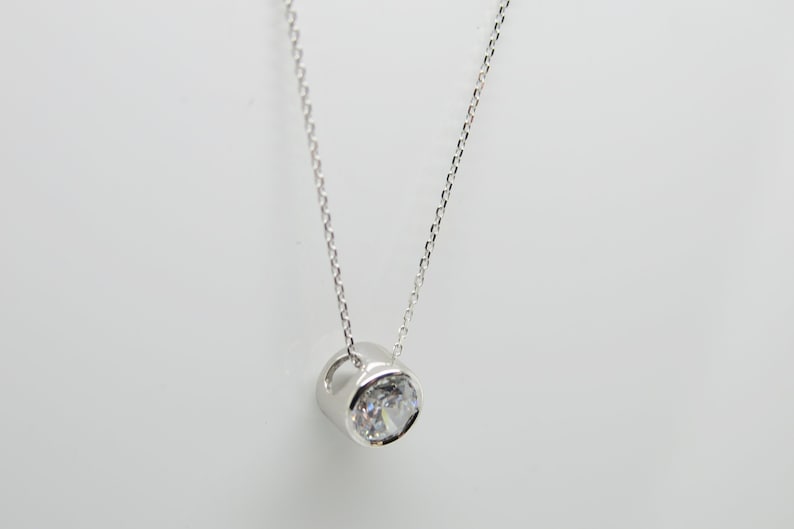 Diamond delicate necklace with pendant zirconia in 375/9k white gold image 1