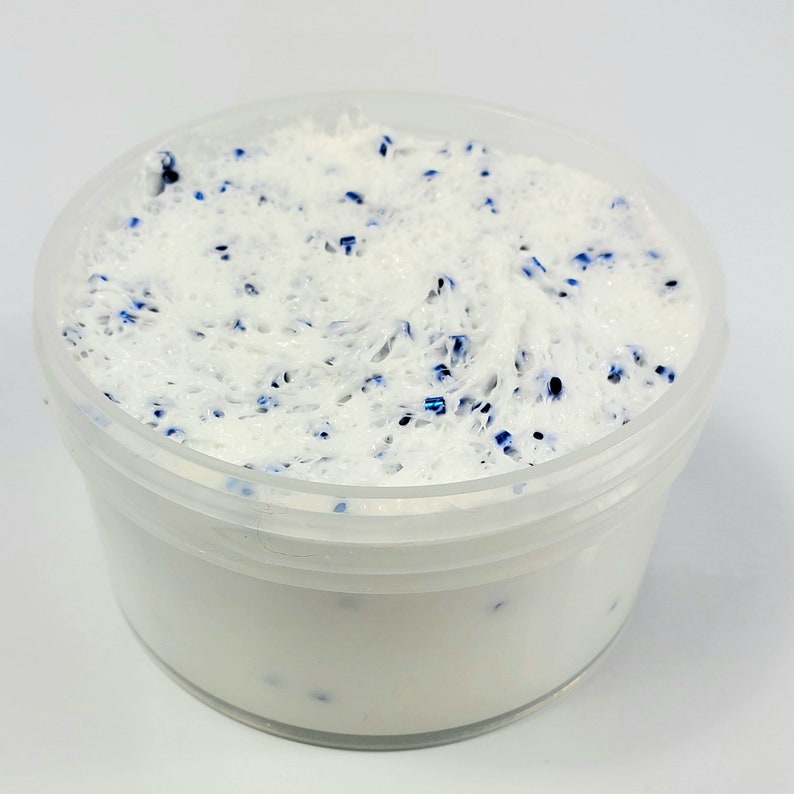 May include: White slime with blue glitter in a clear plastic container.