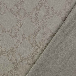 Op de afbeelding: Close-up van twee stofstalen. Een staal is lichtbeige met een subtiel reliëfpatroon. De andere staal is effen lichtgrijs.