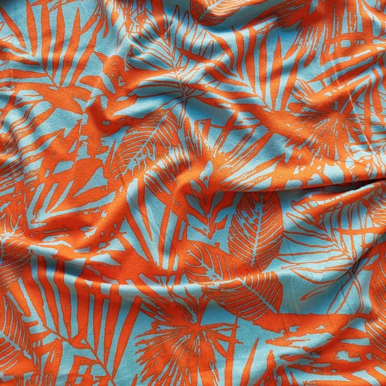 Viscose jersey fabric tropical leaves, orange turquoise image 2