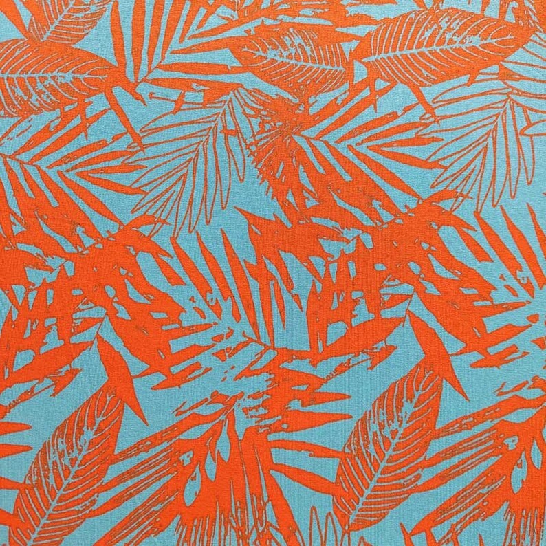 Viscose jersey fabric tropical leaves, orange turquoise image 1