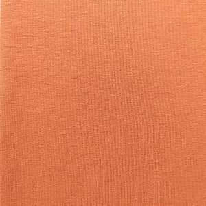 Biologische sweatstof French Terry effen, licht terracotta