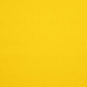 Könnte beinhalten: Einfarbiger gelber Hintergrund mit einer dezenten Textur.