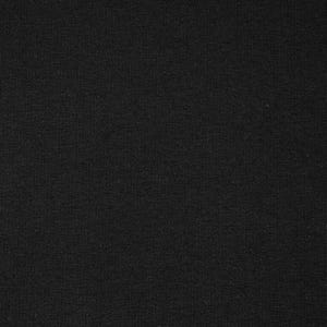 Op de afbeelding: Een close-up van een zwarte stof met een textuur.