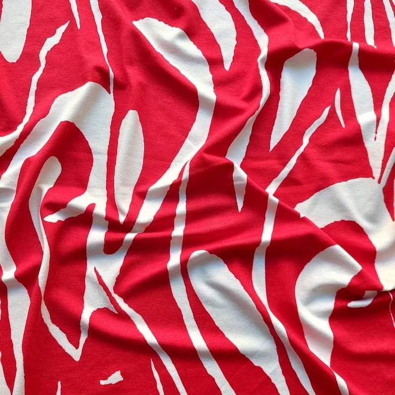 Viskosejersey Stoff abstraktes Muster, weiß rot Bild 2