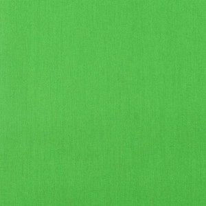 Pode incluir: Um tecido verde brilhante com uma textura visível. A cor é uniforme em todo o material, destacando o padrão sutil. O tecido parece ser de peso médio, adequado para vários projetos de artesanato ou costura.