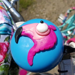 blue bicycle bell decorated Flamingo