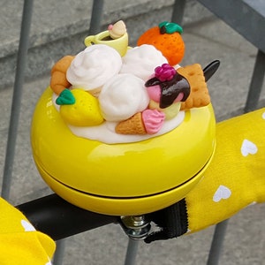 yellow bike bell hand decorated