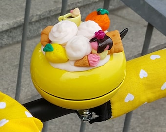 yellow bike bell hand decorated