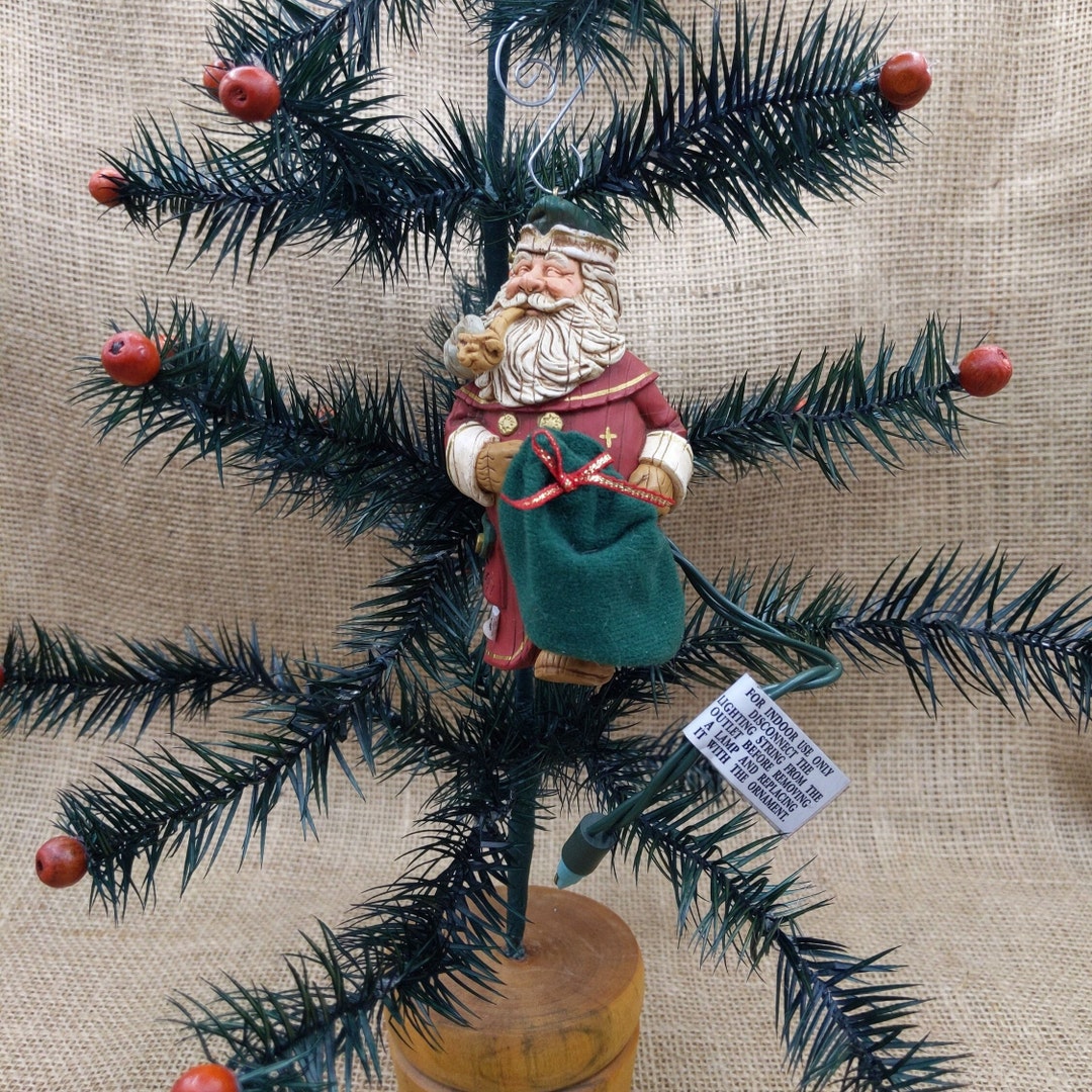 Santa's Secret Gift, 1997 Hallmark Magic Musical Keepsake Ornament