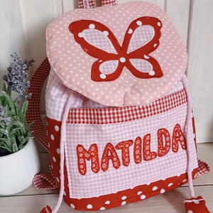 Kindergarten Rucksack Schmetterling rot rosa mit Namen Bild 1