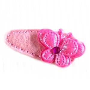 Hair clip ideal for small children and toddler's thin hair because they hold great and do not grip. image 1