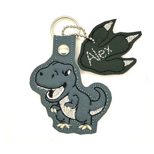 Porte-clés Dino Dinosaure Nom Pendentif Porte-clés Sac à dos Étiquette de nom Étiquette de bagage Sac d'école Cartable Personnalisé
