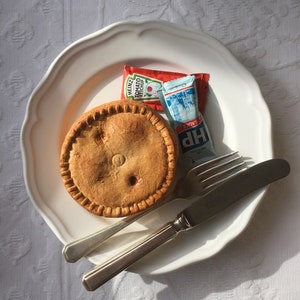 Realistic Pork Pie Prop – Hand-Painted Food Replica for Display