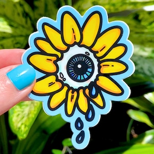CRYING SUNFLOWER - Eyeball Flower vinylkunst sticker van Spooky Doodle Club