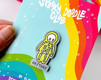 HE/THEY PRONOUN Pin ~ Skeleton Gender Identity Acrylic Badge, Gothic Pride Month Gift by Spooky Doodle Club (1.5 inch)