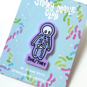 SHE/THEY Pronoun Pin ~ Cute Skeleton Acrylic Pin, Prevent Misgendering, She/They Halloween Style Accessory, LGBTQ Pronouns Badge (2 inch)