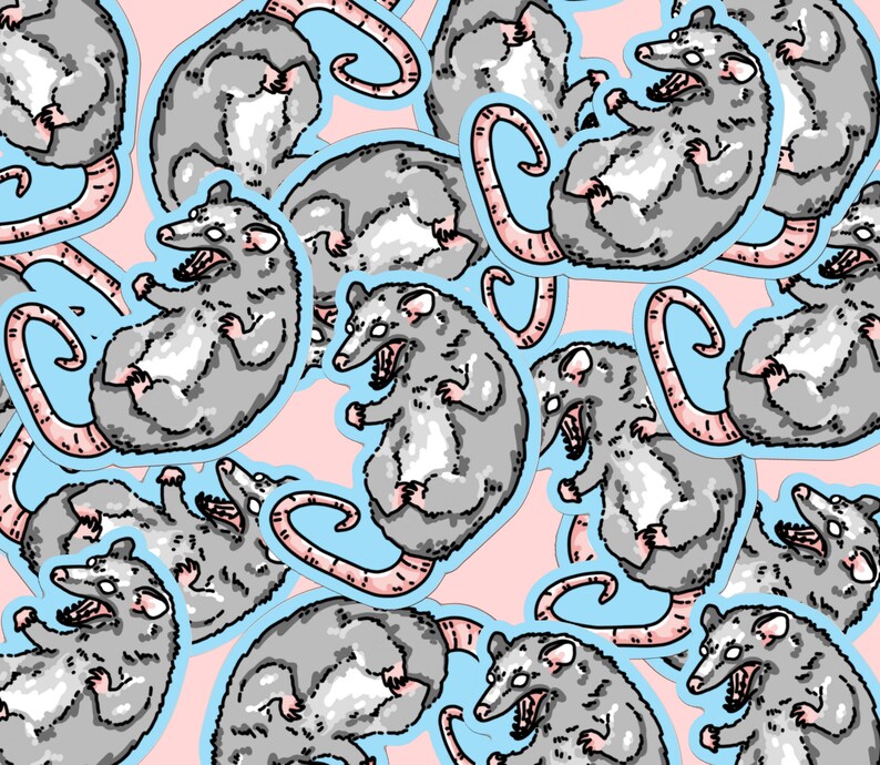 May include: A repeating pattern of gray opossums with white markings on a light pink background. The opossums are drawn in a cartoon style with exaggerated features and are shown in various poses. The opossums have large, toothy grins and are shown with their tails curled up.