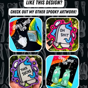 May include: Four different spooky themed enamel pins. The pins are all in the shape of a tombstone with different sayings on them. The sayings are "Oh Shit", "This Sucks", "Ghostly Torture & Tales", and "Spooky Doodle Club".