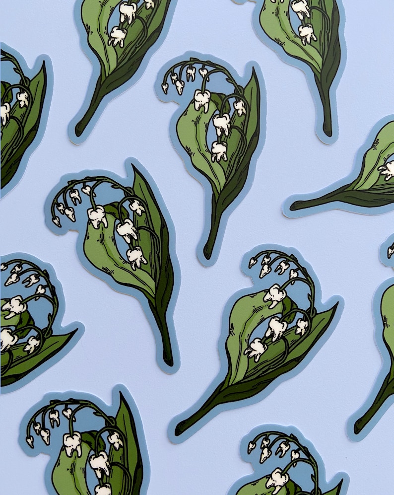 May include: A set of nine stickers featuring a whimsical illustration of a bouquet of lily of the valley flowers with teeth instead of bells. The flowers are green and white, and the background is light blue.