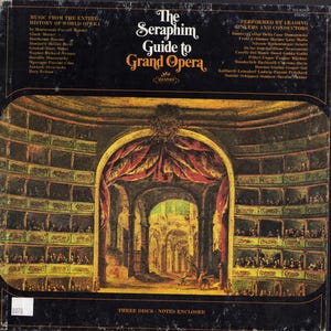 May include: Vintage vinyl record album cover for "The Seraphim Guide to Grand Opera." The cover features an illustration of an opera house interior with a stage and audience. The album includes three discs and notes.