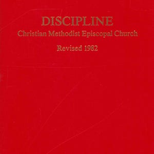 May include: A red book cover with the word "DISCIPLINE" in gold lettering. Below, the text reads "Christian Methodist Episcopal Church" and "Revised 1982". The cover has a slightly textured appearance.
