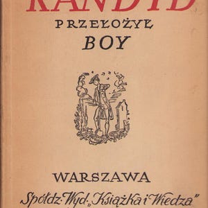 May include: Vintage book cover with the title "WOLTER KANDYD" in red letters. The cover also features the text "PRZEŁOŻYŁ BOY" and an illustration of a man. The book was published in Warsaw by Spółdz. Wyd. Książkai Wiedza.