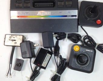 Atari 2600 "Rainbow" 4-Switch Video Game Console with 2 Joysticks and 2 Power Adapters, Early 1980s, 0126