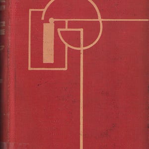 May include: Red book cover with a geometric design in a light brown color. The design features a circle, a rectangle, and a vertical line.