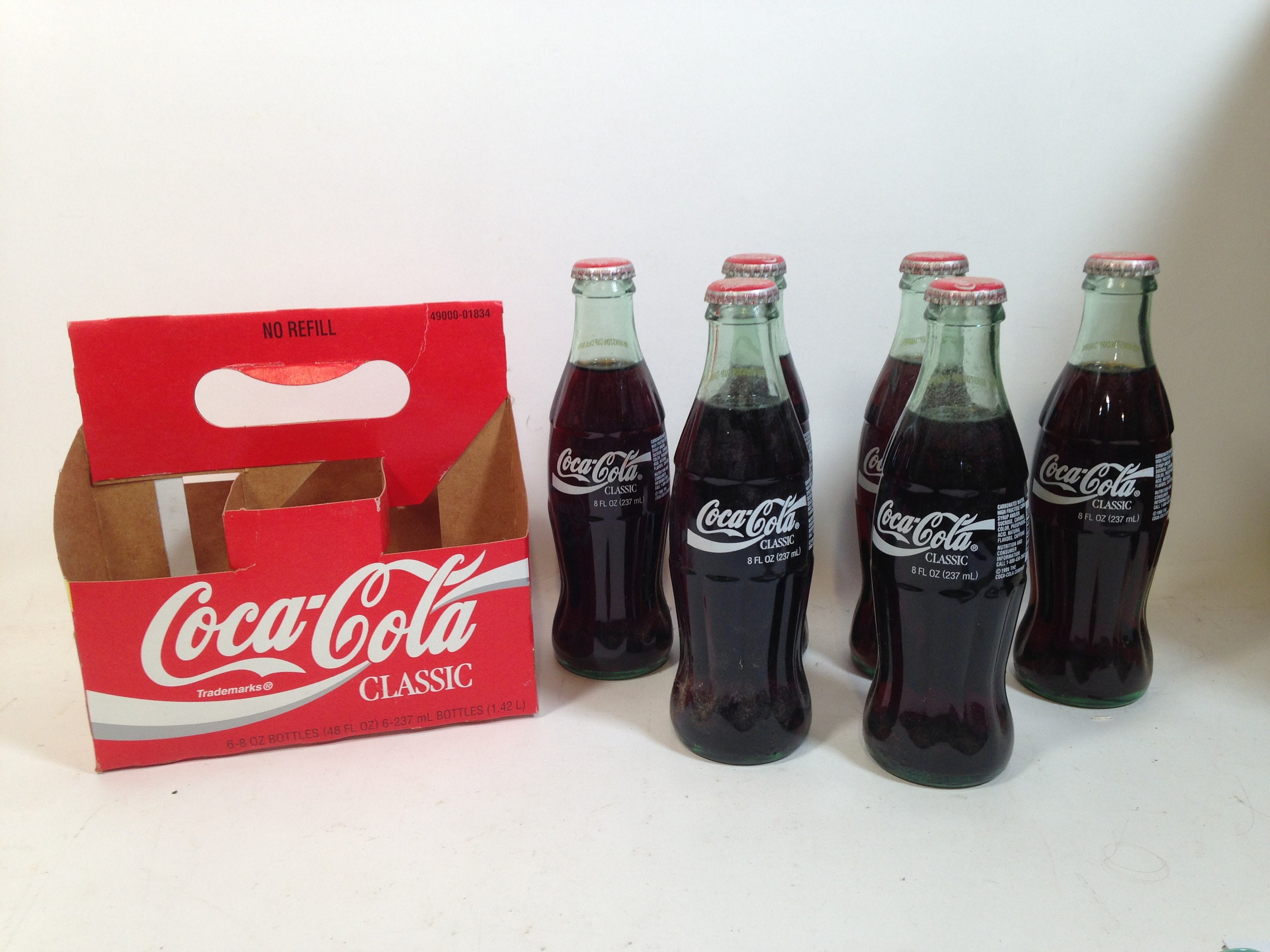 10 OZ COCA COLA COMMEMORATIVE BOTTLE - 1985 INGLES 100TH STORE OPENING