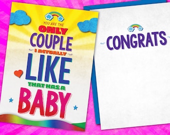 May include: A greeting card with a rainbow and clouds design. The text on the card reads "You are the only couple I actually like that has a baby." and "Congrats".