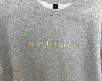 Overstimulated Grey Sweatshirt | Rainbow Letters | Embroidered | Unisex