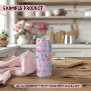 May include: A stainless steel tumbler with a colorful pattern of heart-shaped lollipops and bows on a light purple background. The text "EXAMPLE PRODUCT" is at the top, and "DIGITAL DOWNLOAD - NO PHYSICAL ITEMS WILL BE SENT" is at the bottom.