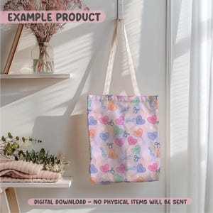 May include: A tote bag with a pastel heart and lollipop pattern. The bag has cream-colored straps and features the text "EXAMPLE PRODUCT" at the top. The bottom of the image reads "DIGITAL DOWNLOAD - NO PHYSICAL ITEMS WILL BE SENT."