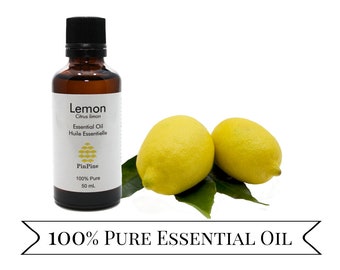 May include: A 50 ml amber glass bottle of 100% pure lemon essential oil with a white label that reads "Lemon Citrus limon Essential Oil Huile Essentielle PinPine 100% Pure 50 ml". Two whole lemons are in the background.