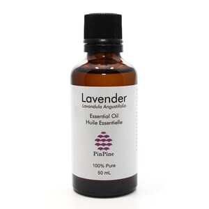 May include: A brown glass bottle with a black cap containing lavender essential oil. The label reads "Lavender Lavandula Angustifolia Essential Oil Huile Essentielle PinPine 100% Pure 50 mL".