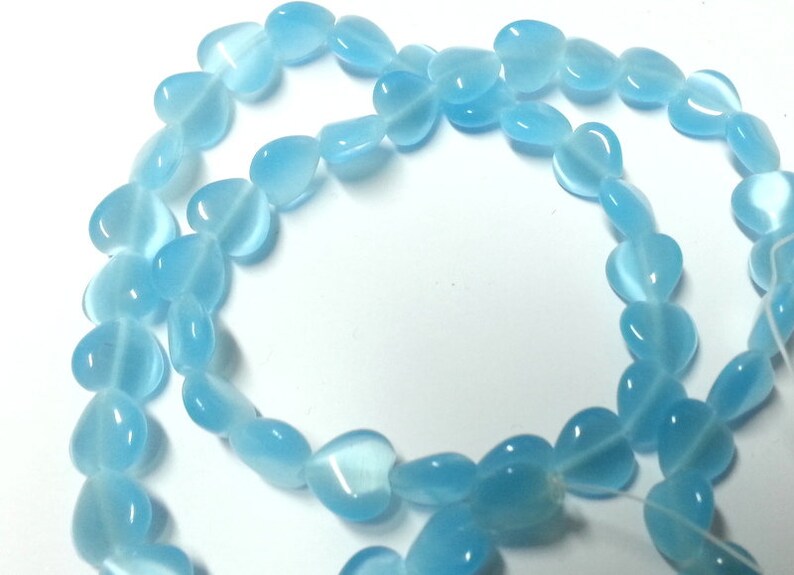 Reduces 39 blue rectangular flat glass beads