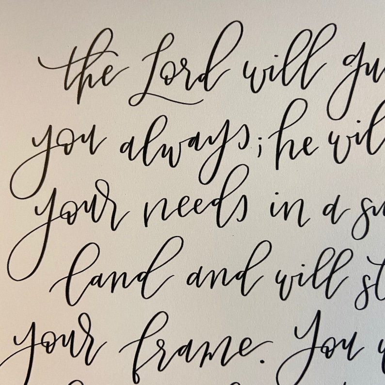 May include: Black and white calligraphy on a white background with the text "the Lord will guide you always; he will supply your needs in a season of plenty and will strengthen your frame. You are his"
