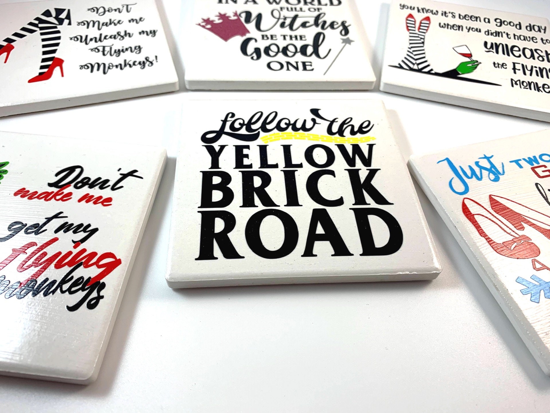The Wizard of Oz Ruby Slippers Logo Low Profile Novelty Cork Coaster Set The Wizard of Oz Ruby Slippers Logo Low Profile Novelty Cork Coaster Set