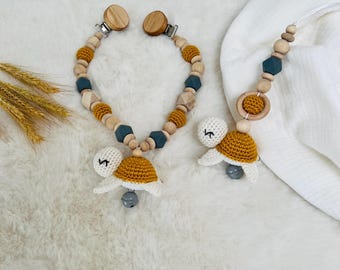 Set cadena cochecito + colgante Maxicosi tortuga beige