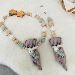 Set stroller chain + Maxicosi pendant Otter