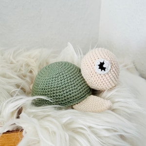 Music box turtle crocheted with desired melody dove color