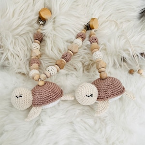 Set stroller chain + maxicosi pendant turtle