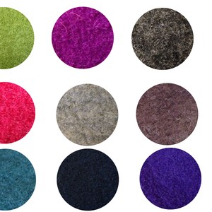 May include: Nine round felt samples in various colors, including green, purple, pink, gray, brown, teal, and navy.