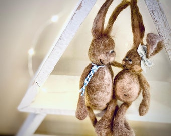 Pair of bunnies made of cuddly felt wool - art enjoyment