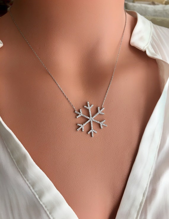 Snowflake Pendant 8-point with 9 Cubic Zirconia Sterling Silver - Includes Chain Snowflake Pendant 8-point with 9 Cubic Zirconia Sterling Silver - Includes Chain