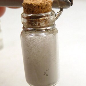 diamond dust in a glass bottle